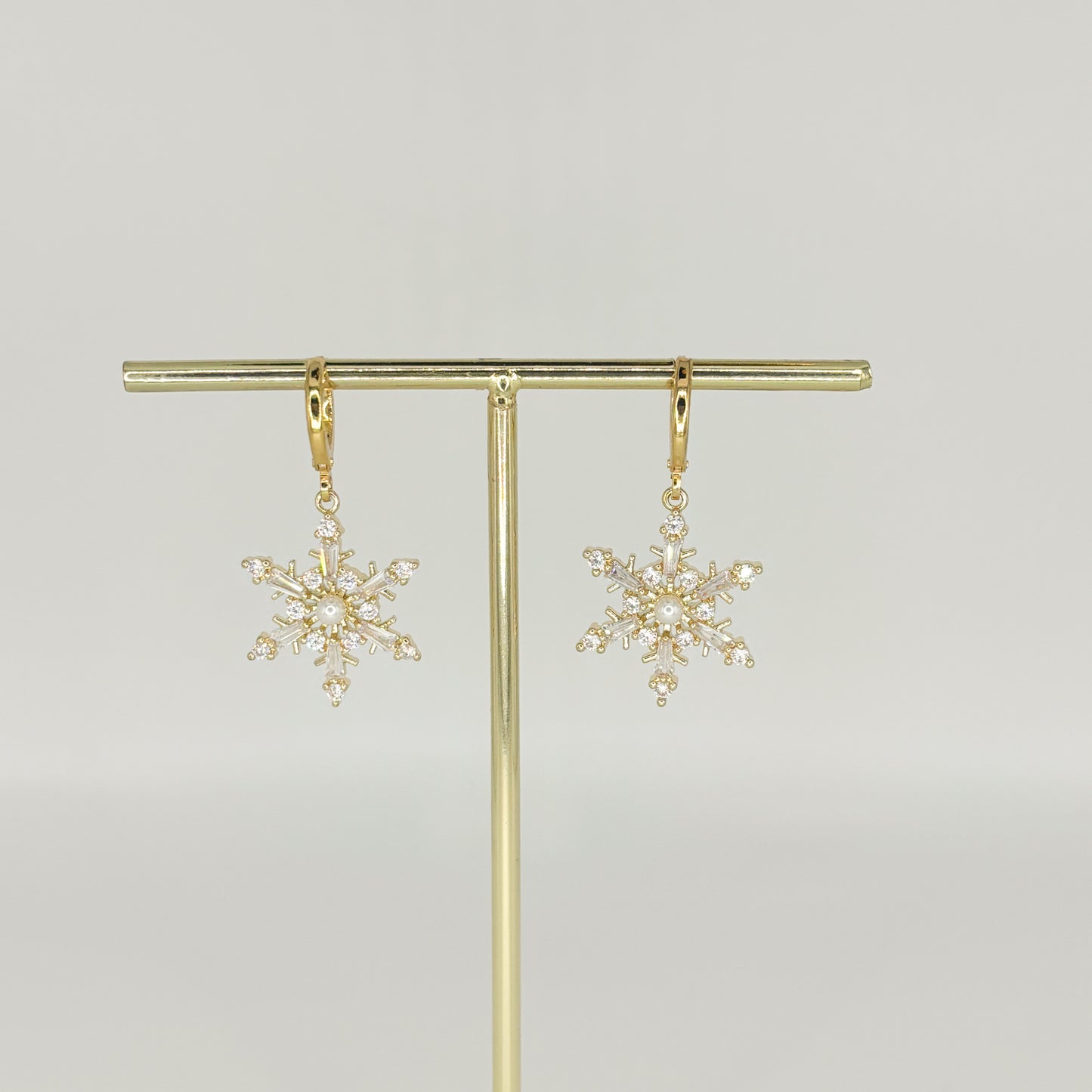 gold snowflake earrings