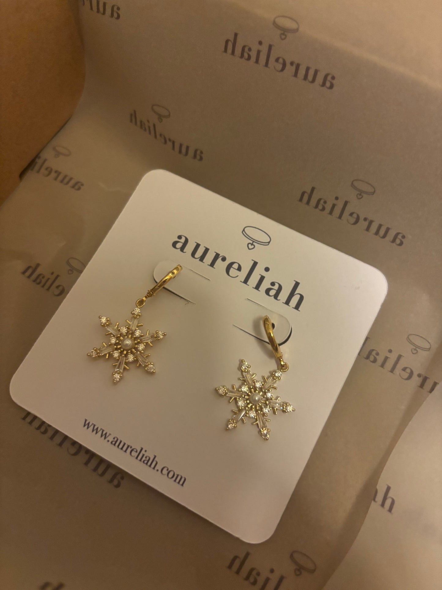 snowflake gold earrings